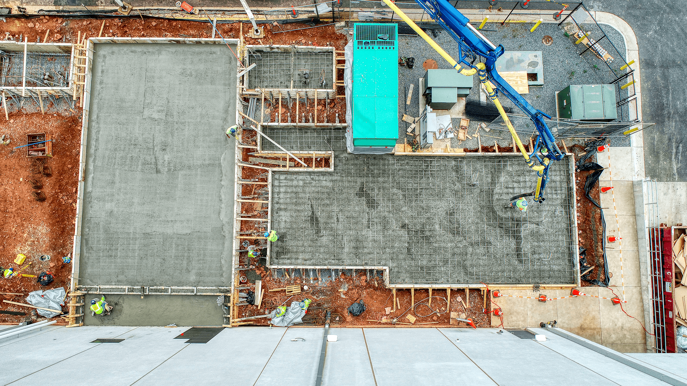 Overhead aerial view of concrete foundation work with rebar
