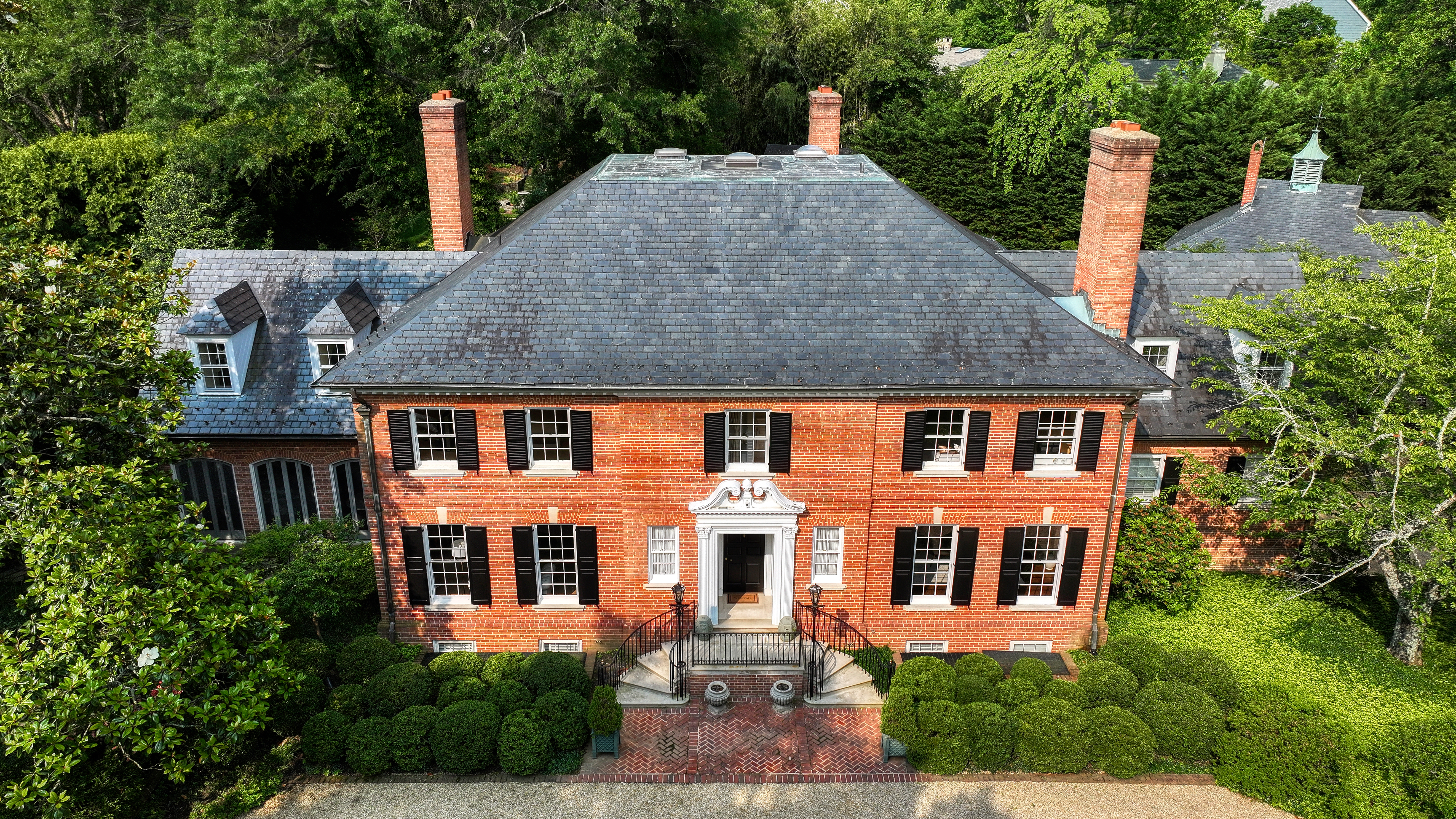Aerial view of Georgian brick estate home